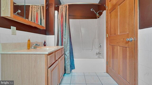 132 Sycamore Dr, Palmerton, PA 18071 - full bathroom featuring vanity, shower / bath combo, tile patterned floors, and tile walls