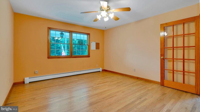 132 Sycamore Dr, Palmerton, PA 18071 - spare room with a baseboard radiator, wood finished floors, and ceiling fan