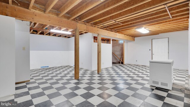 132 Sycamore Dr, Palmerton, PA 18071 - finished below grade area featuring tile patterned floors and fridge
