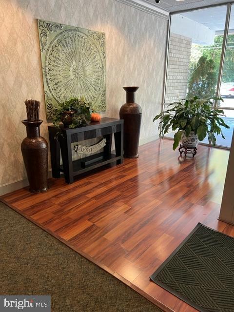 401 Cooper Landing Rd Unit 207Playa, Del Sol, Cherry Hill, NJ 08002 - sitting room featuring wallpapered walls and wood finished floors