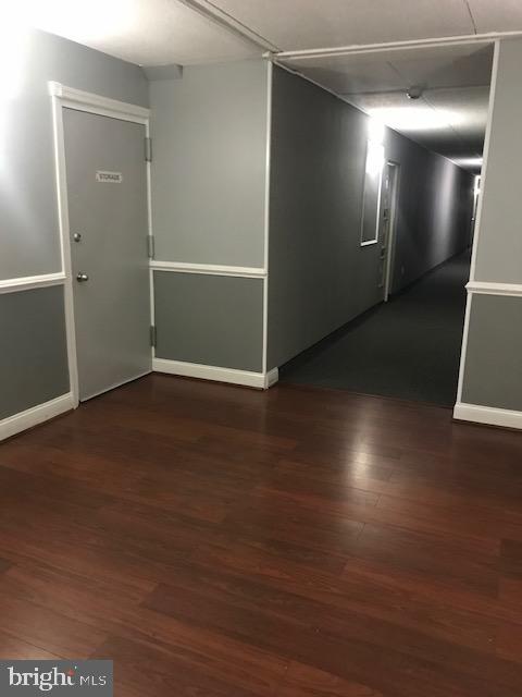 401 Cooper Landing Rd Unit 207Playa, Del Sol, Cherry Hill, NJ 08002 - hall with dark wood-style flooring and baseboards