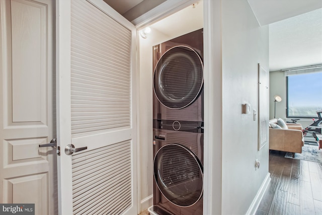 2451 Midtown Ave Unit 1323, Alexandria, VA 22303 - laundry area with stacked washer / drying machine and wood finished floors