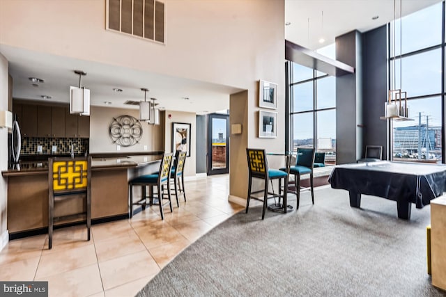 2451 Midtown Ave Unit 1323, Alexandria, VA 22303 - playroom with a towering ceiling, light tile patterned floors, and billiards