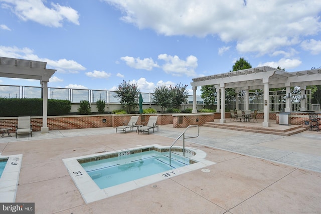 2451 Midtown Ave Unit 1323, Alexandria, VA 22303 - view of swimming pool featuring a community hot tub, a pergola, a patio area, and a pool