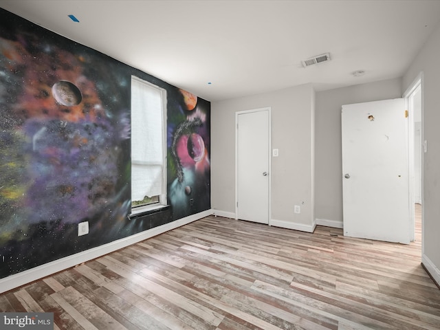 3316 Huntley Square Dr Unit A1, Temple Hills, MD 20748 - spare room with wood finished floors and baseboards