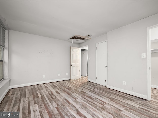 3316 Huntley Square Dr Unit A1, Temple Hills, MD 20748 - unfurnished bedroom featuring wood finished floors