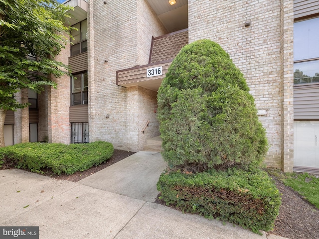 3316 Huntley Square Dr Unit A1, Temple Hills, MD 20748 - doorway to property featuring brick siding