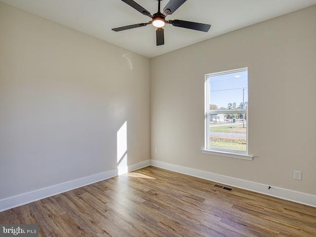 103 Woodland Dr, Montross, VA 22520 - spare room featuring ceiling fan and wood finished floors