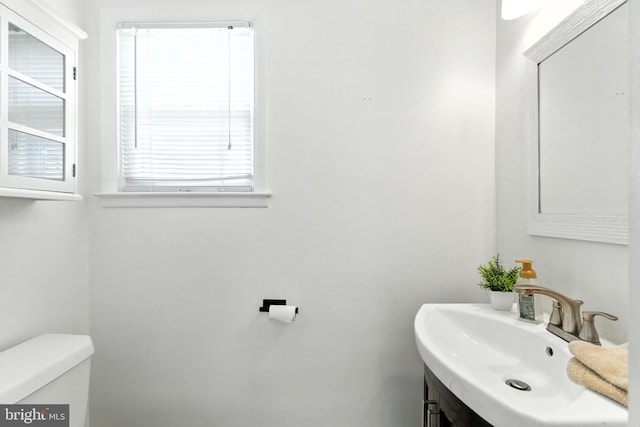 312 Wellington, Reading, PA 19609 - half bath featuring toilet and vanity
