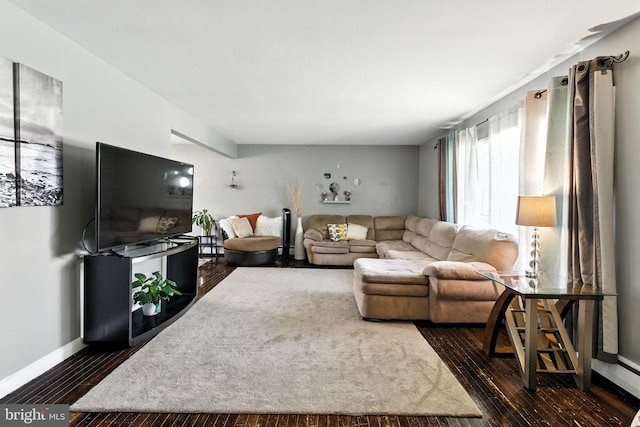 312 Wellington, Reading, PA 19609 - living room featuring dark wood-style flooring and baseboards