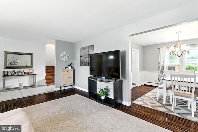 312 Wellington, Reading, PA 19609 - living area with hardwood / wood-style floors and a chandelier