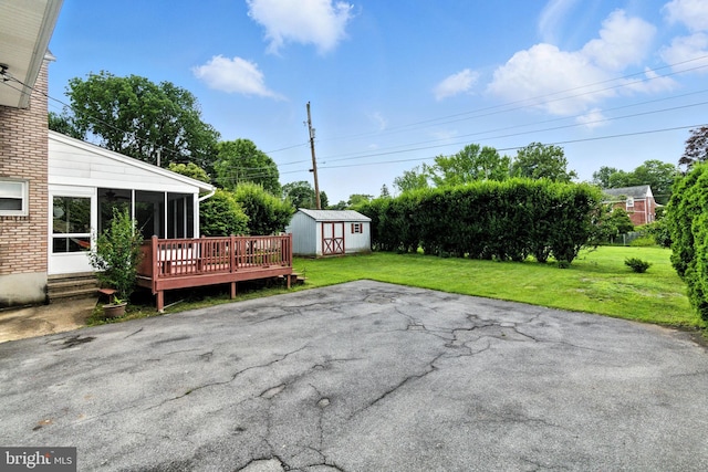 312 Wellington, Reading, PA 19609 - view of patio / terrace with a sunroom, a shed, and a wooden deck