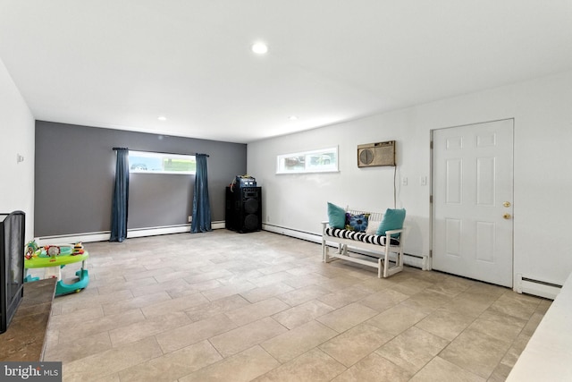 312 Wellington, Reading, PA 19609 - sitting room with a wall mounted air conditioner, a baseboard radiator, baseboard heating, and recessed lighting