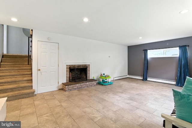 312 Wellington, Reading, PA 19609 - unfurnished living room with stairs, a brick fireplace, and recessed lighting