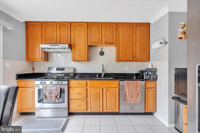 4002 Grenwich Ln, Mount Laurel, NJ 08054 - kitchen with appliances with stainless steel finishes, under cabinet range hood, crown molding, brown cabinetry, and decorative backsplash