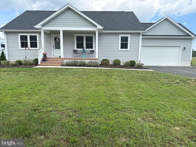 6236 Solomons Cir, Hurlock, MD 21643 - view of front facade featuring a porch, an attached garage, driveway, a front yard, and roof with shingles