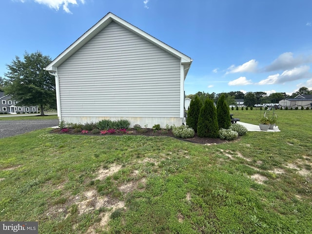6236 Solomons Cir, Hurlock, MD 21643 - view of home's exterior with a lawn