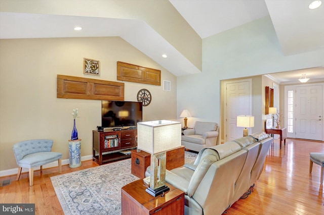 134 Woodhaven Dr, Gettysburg, PA 17325 - living room featuring vaulted ceiling, light wood finished floors, and recessed lighting