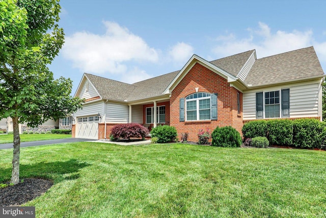 134 Woodhaven Dr, Gettysburg, PA 17325 - view of front of property with brick siding, a garage, a shingled roof, a front lawn, and asphalt driveway