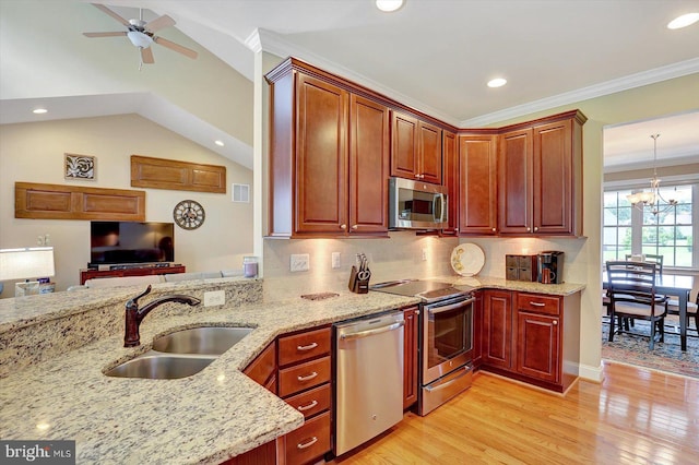134 Woodhaven Dr, Gettysburg, PA 17325 - kitchen with stainless steel appliances, light wood-style floors, recessed lighting, light stone countertops, and ceiling fan