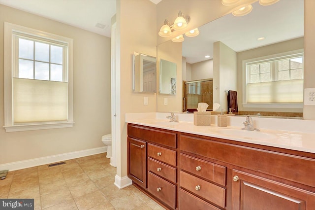 134 Woodhaven Dr, Gettysburg, PA 17325 - bathroom with double vanity, a stall shower, and tile patterned floors