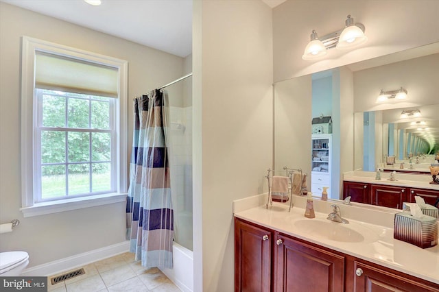 134 Woodhaven Dr, Gettysburg, PA 17325 - bathroom featuring healthy amount of natural light, vanity, shower / tub combo, and tile patterned floors