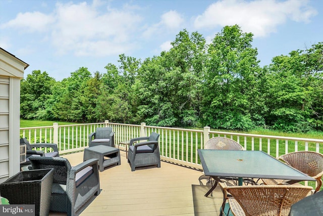 134 Woodhaven Dr, Gettysburg, PA 17325 - wooden deck featuring outdoor dining area, a yard, and an outdoor hangout area