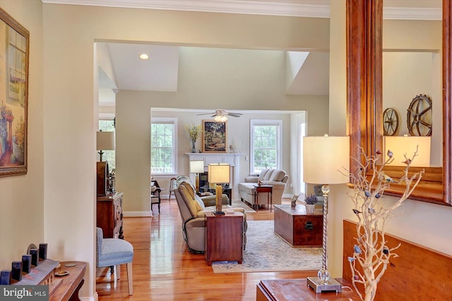134 Woodhaven Dr, Gettysburg, PA 17325 - living area featuring light wood-style flooring, a ceiling fan, recessed lighting, a fireplace, and ornamental molding