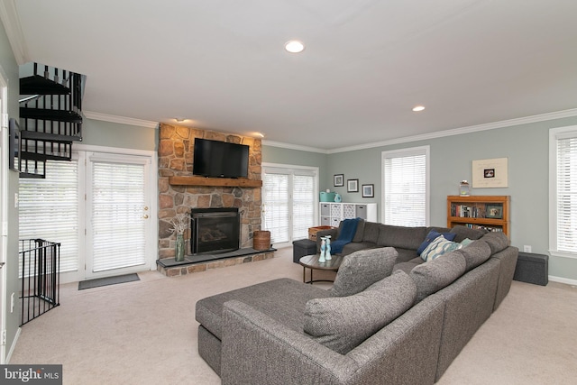319 E Atlantic Ave, Haddon Heights, NJ 08035 - carpeted living room featuring ornamental molding, a stone fireplace, and recessed lighting