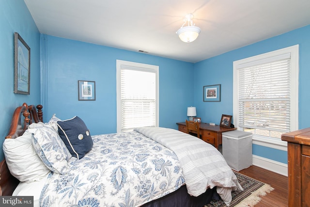 319 E Atlantic Ave, Haddon Heights, NJ 08035 - bedroom with wood finished floors and multiple windows