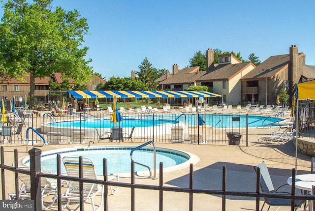 5100 Convent Ln Unit 219, Philadelphia, PA 19114 - community pool with a patio area