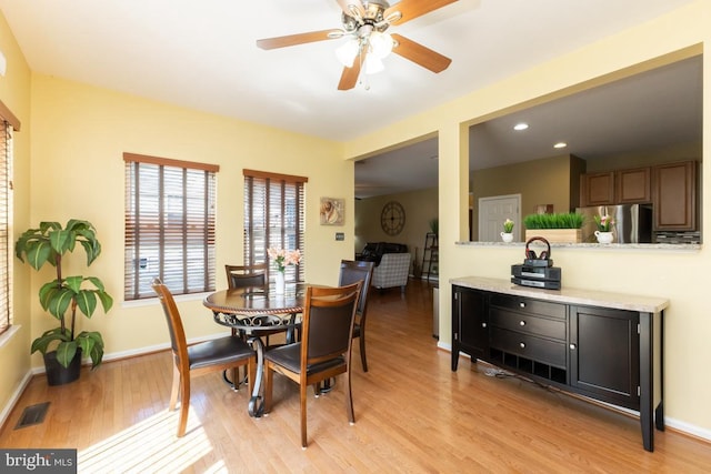 16435 Regatta Ln, Woodbridge, VA 22191 - dining space with light wood-style flooring, ceiling fan, and recessed lighting