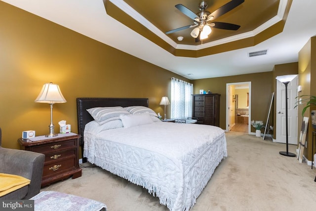 16435 Regatta Ln, Woodbridge, VA 22191 - bedroom featuring a raised ceiling, light carpet, ornamental molding, connected bathroom, and ceiling fan
