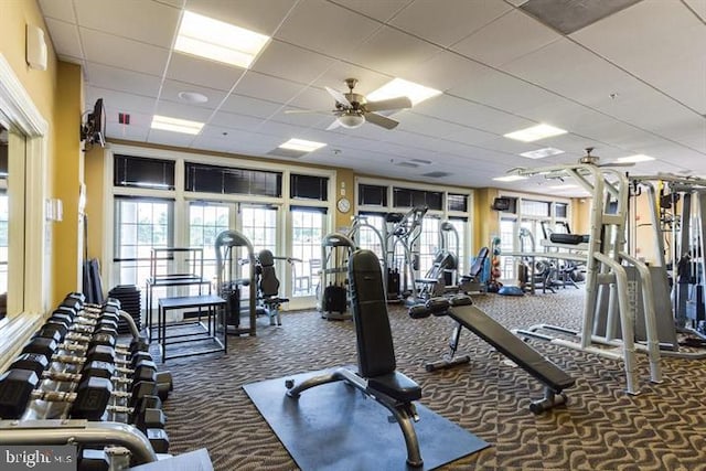 16435 Regatta Ln, Woodbridge, VA 22191 - workout area with ceiling fan, carpet floors, and a paneled ceiling