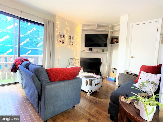 304 W Wildey St, Philadelphia, PA 19123 - living room with hardwood / wood-style floors and a fireplace with raised hearth