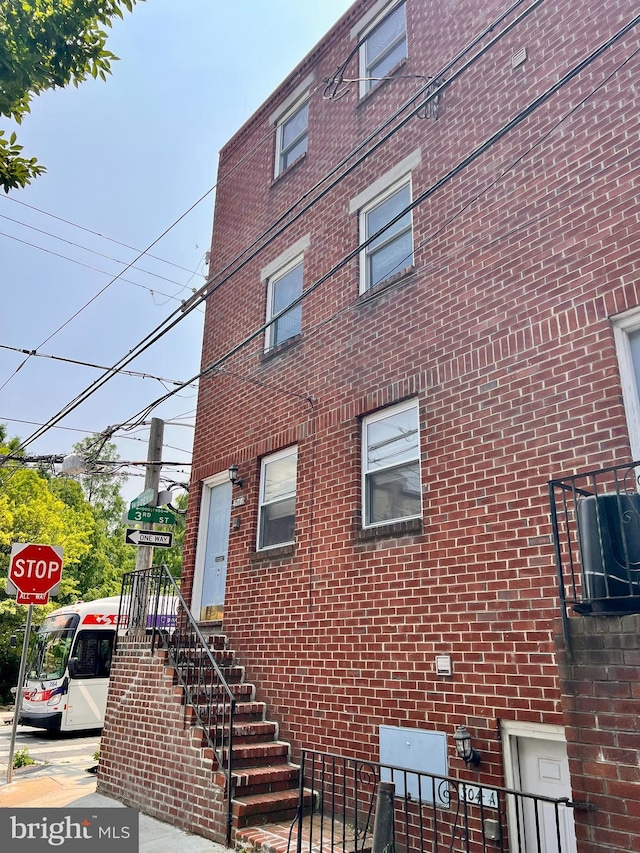 304 W Wildey St, Philadelphia, PA 19123 - view of property exterior featuring brick siding