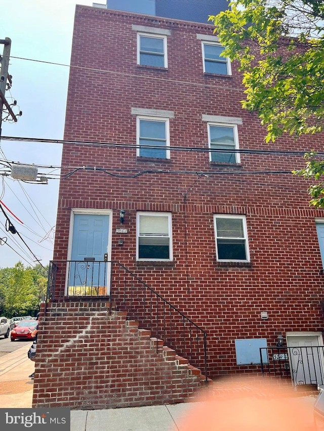 304 W Wildey St, Philadelphia, PA 19123 - view of front of property with brick siding