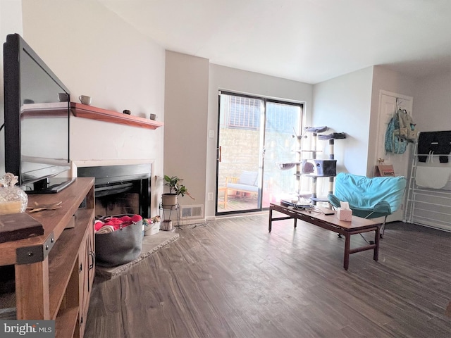 304 W Wildey St, Philadelphia, PA 19123 - living area featuring wood finished floors and a fireplace
