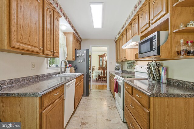 1202 Forestville Dr, Great Falls, VA 22066 - kitchen with appliances with stainless steel finishes, under cabinet range hood, brown cabinetry, and open shelves