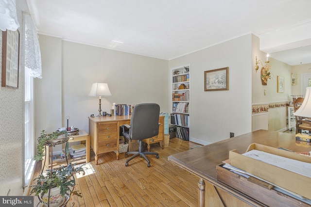 1202 Forestville Dr, Great Falls, VA 22066 - home office with light wood-style floors, crown molding, and healthy amount of natural light