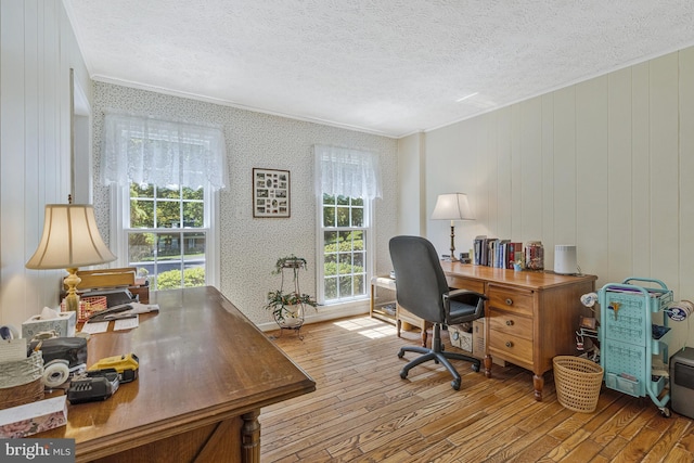 1202 Forestville Dr, Great Falls, VA 22066 - home office featuring crown molding, hardwood / wood-style flooring, plenty of natural light, and a textured ceiling