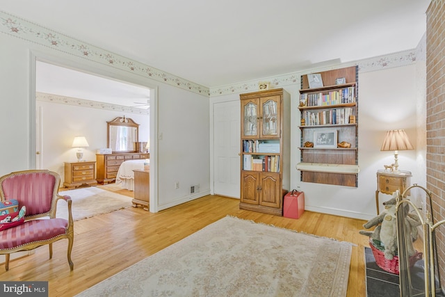 1202 Forestville Dr, Great Falls, VA 22066 - living area featuring wood finished floors and baseboards