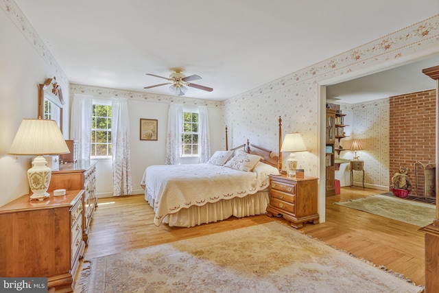 1202 Forestville Dr, Great Falls, VA 22066 - bedroom featuring wallpapered walls, light wood-style flooring, and a ceiling fan
