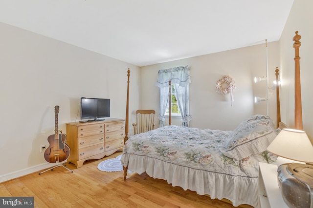 1202 Forestville Dr, Great Falls, VA 22066 - bedroom with wood finished floors and baseboards
