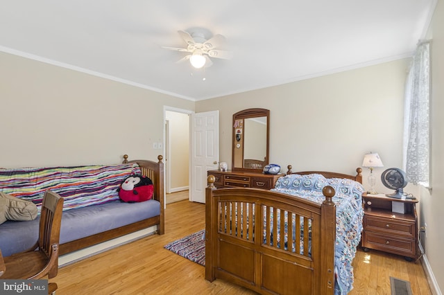 1202 Forestville Dr, Great Falls, VA 22066 - bedroom featuring wood finished floors, crown molding, ceiling fan, and arched walkways