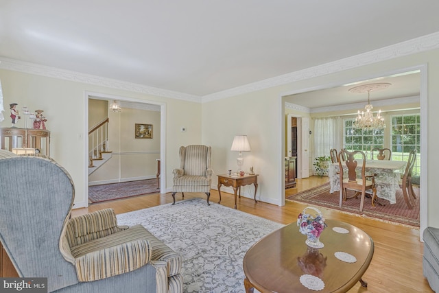 1202 Forestville Dr, Great Falls, VA 22066 - living room with a chandelier, stairway, wood finished floors, and ornamental molding