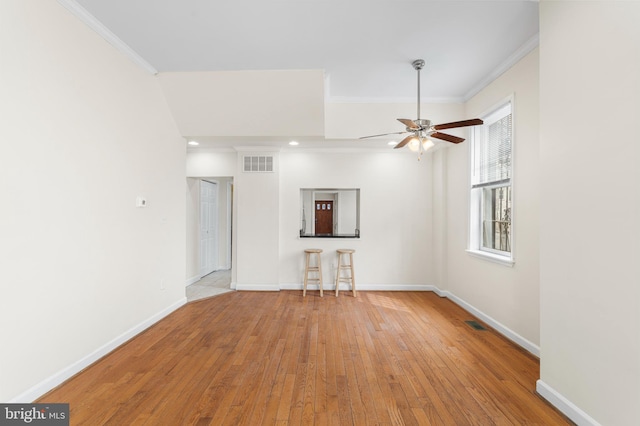 1401 Druid Hill Ave, Baltimore, MD 21217 - unfurnished living room featuring crown molding, ceiling fan, wood-type flooring, and recessed lighting