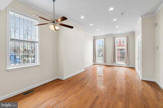 1401 Druid Hill Ave, Baltimore, MD 21217 - unfurnished room with crown molding, a ceiling fan, light wood-style flooring, and recessed lighting