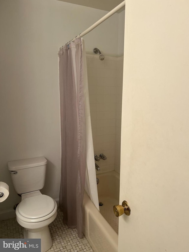 12157 Pineneedle Ct, Woodbridge, VA 22192 - bathroom with shower / bath combo with shower curtain and tile patterned floors