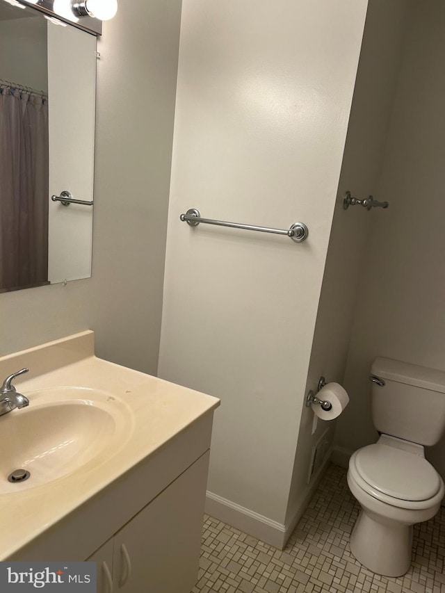 12157 Pineneedle Ct, Woodbridge, VA 22192 - bathroom with vanity and tile patterned floors